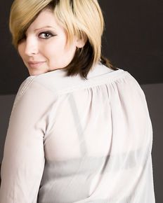 Plump girl undresses and shows her charms