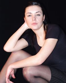 Young russian girl Anna is posing and undresses