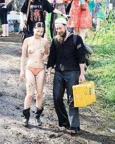 Russian girls are having fun at the bardic festival in the forest