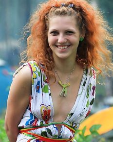 Russian girls are having fun at the bardic festival in the forest