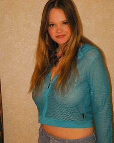Young Kissy in blue blouse