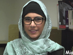 Slim dark haired mia khalifa is prepped to get bare on web cam