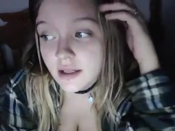 Flirty doll with yam-sized milk cans is posing on live web cam and toying with her milk bra-stuffers