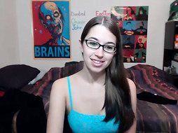 Thin nubile dark haired with glasses, Alexxx Coal is toying with herself in front of the web camera