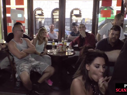 Publicly humiliated sub sucking cock with voyeurs watching