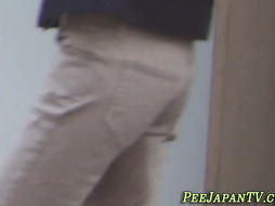 Japanese woman peeing her pants