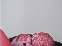 She has a sexy fishnet dress