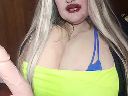 Susi is sitting and rubbing toy cock enjoy it