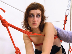 Humiliated sub drinks pee while tied up