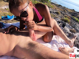 Amateur Thai teen fucking a BWC at beach