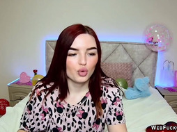 Cute redhead babe chats on webcam