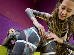 Tattooed hotties fuck each other with crazy toys