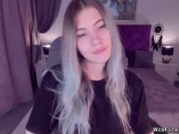 Blonde teen smoking and stripping off