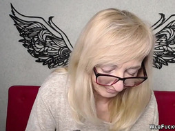 Blonde MILF with glasses on webcam