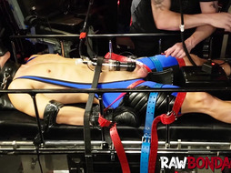 Dungeon master punishes jock in gas mask and cock pumping