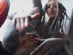 Gorgeous tattooed girl fucks her ass
